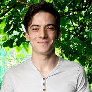 Smiling young man with dark hair